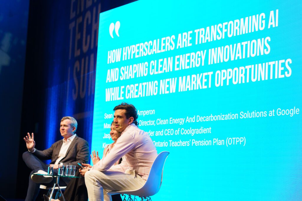 Energy Tech Summit panel on AI and clean energy innovation featuring Google and industry leaders on stage.