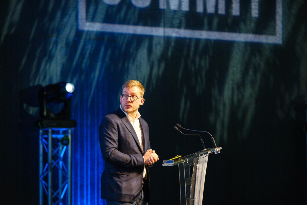 Director of Strategy at Corinex sharing his insights on the Energy Tech Summit conference stage in 2026